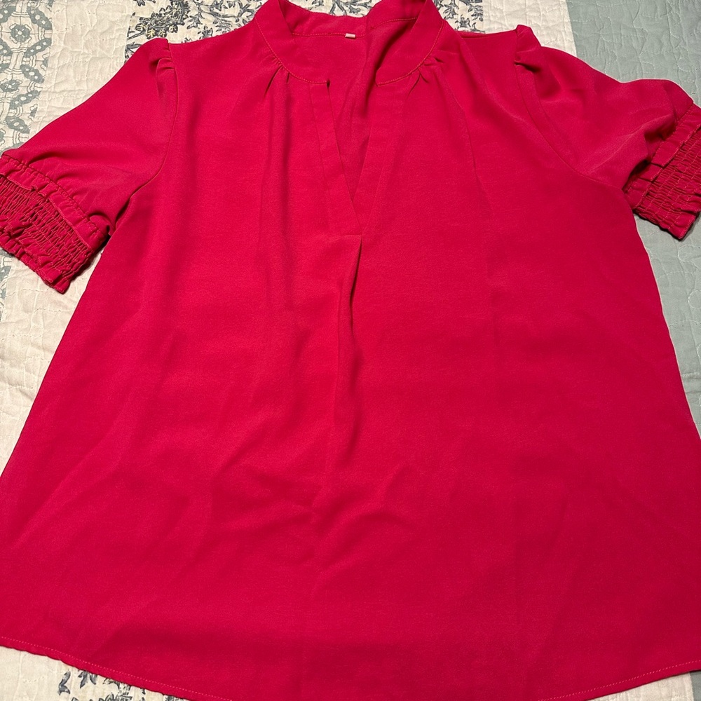 V-neck fuchsia blouse with ruffle sleeves
